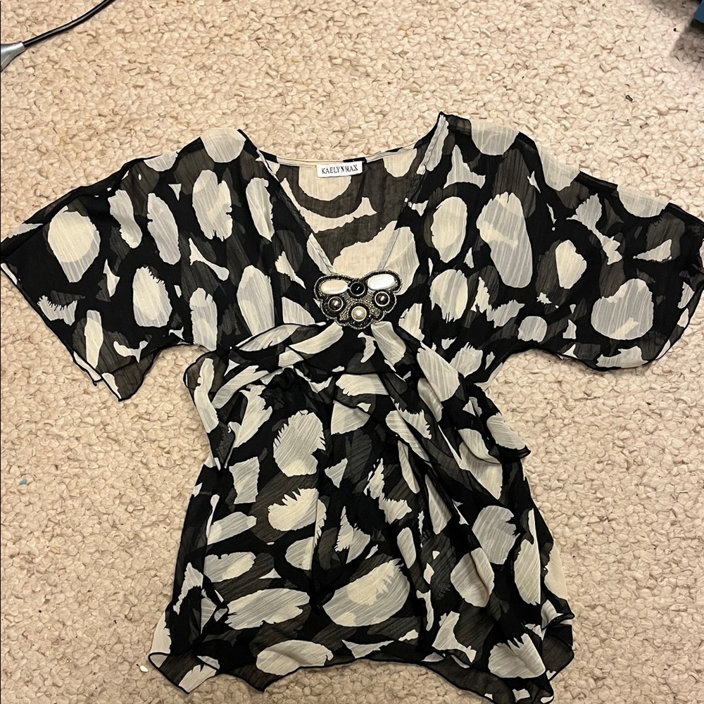 Chic Black and Cream Blouse with Embellishment